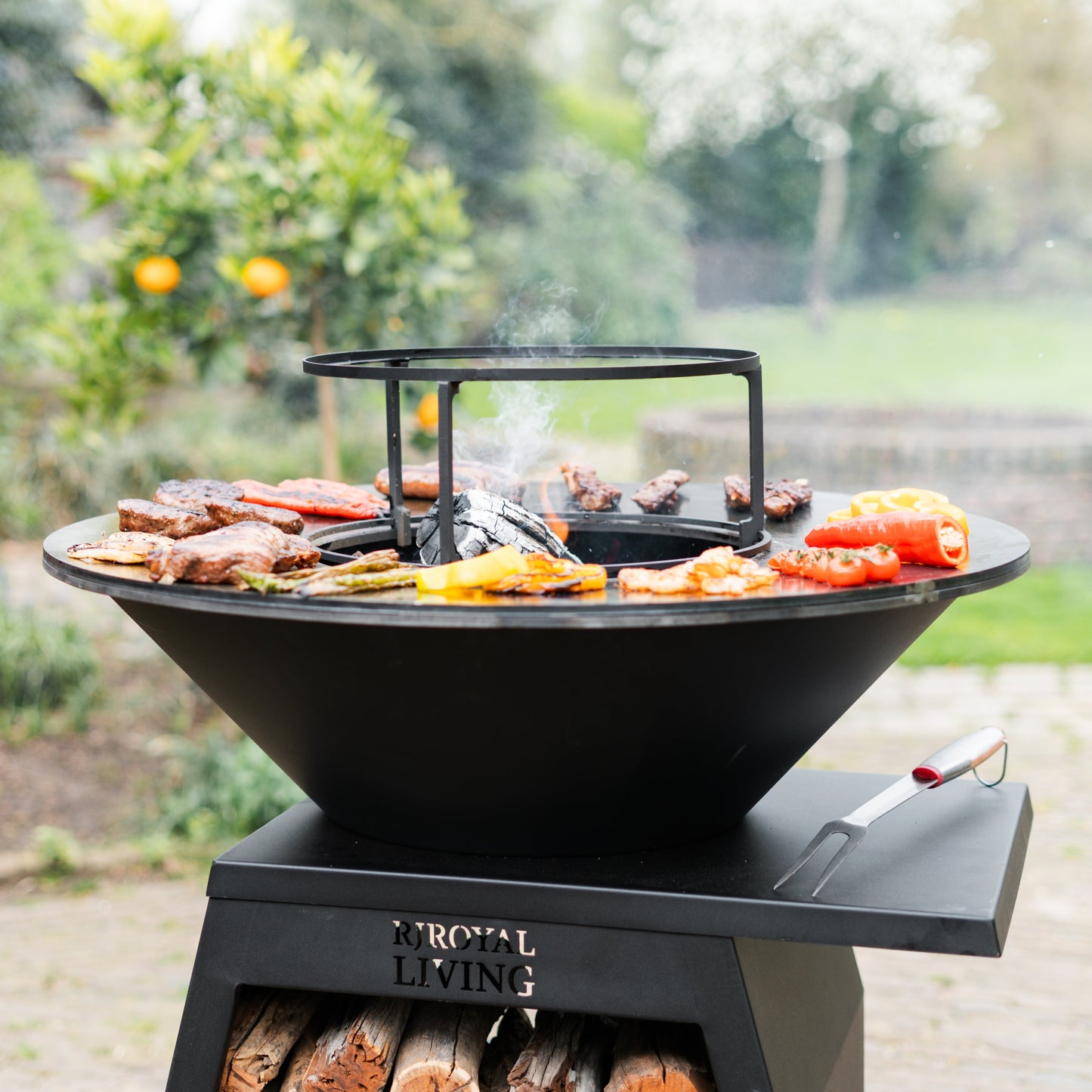 BBQ Plancha Grill Compañero XXL Blackline - With poker and wood storage Ø80cm