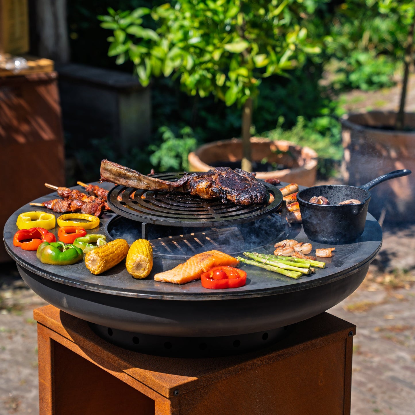 BBQ Plancha Grill Hermano XXL Blackline Corten steel - With poker and wood storage Ø80cm 8mm