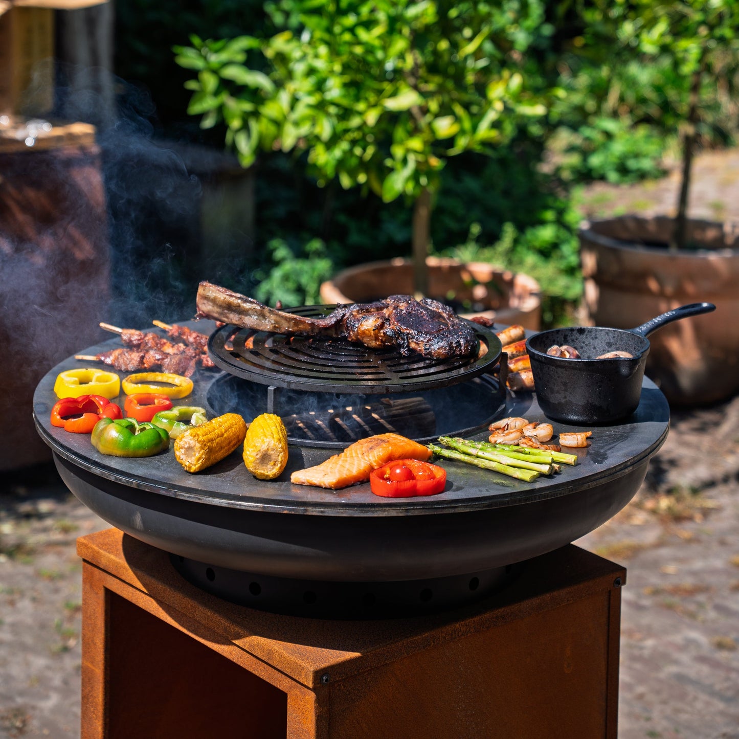 BBQ Plancha Grill Hermano XXL Blackline Corten steel - With poker and wood storage Ø80cm 8mm