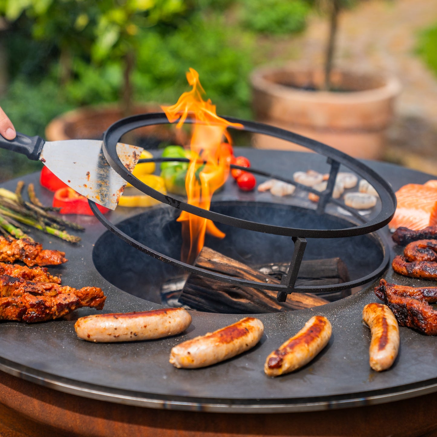 BBQ Plancha Grill Hermano XXL Corten steel - With poker and wood storage Ø80cm 8mm