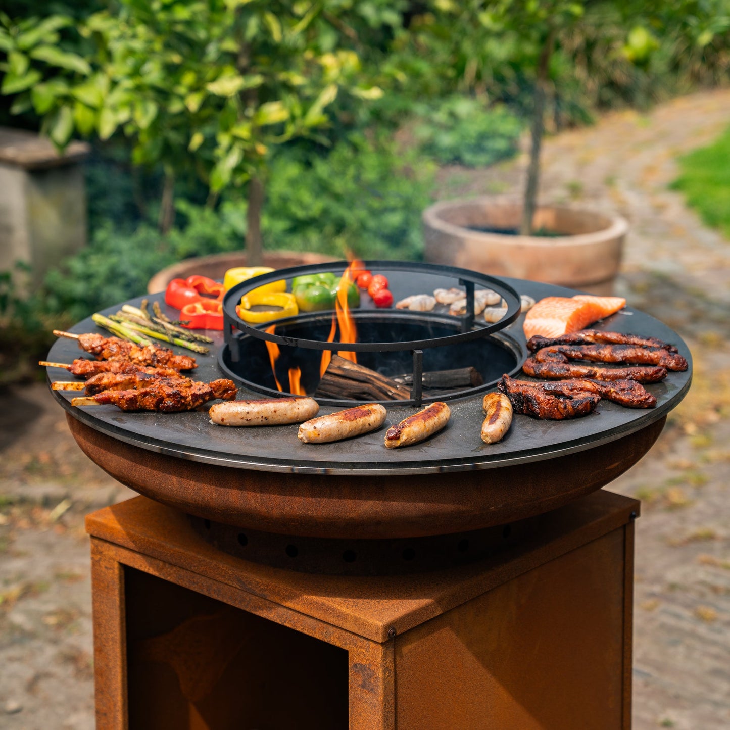 BBQ Plancha Grill Hermano XXL Corten steel - With poker and wood storage Ø80cm 8mm