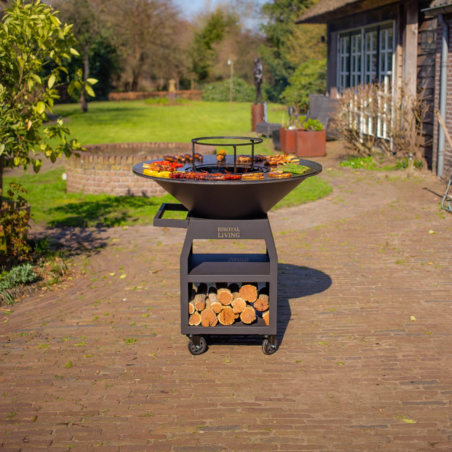 BBQ Plancha Grill Maestro XXXL Ø100cm Blackline - With large wheels and woodstorage