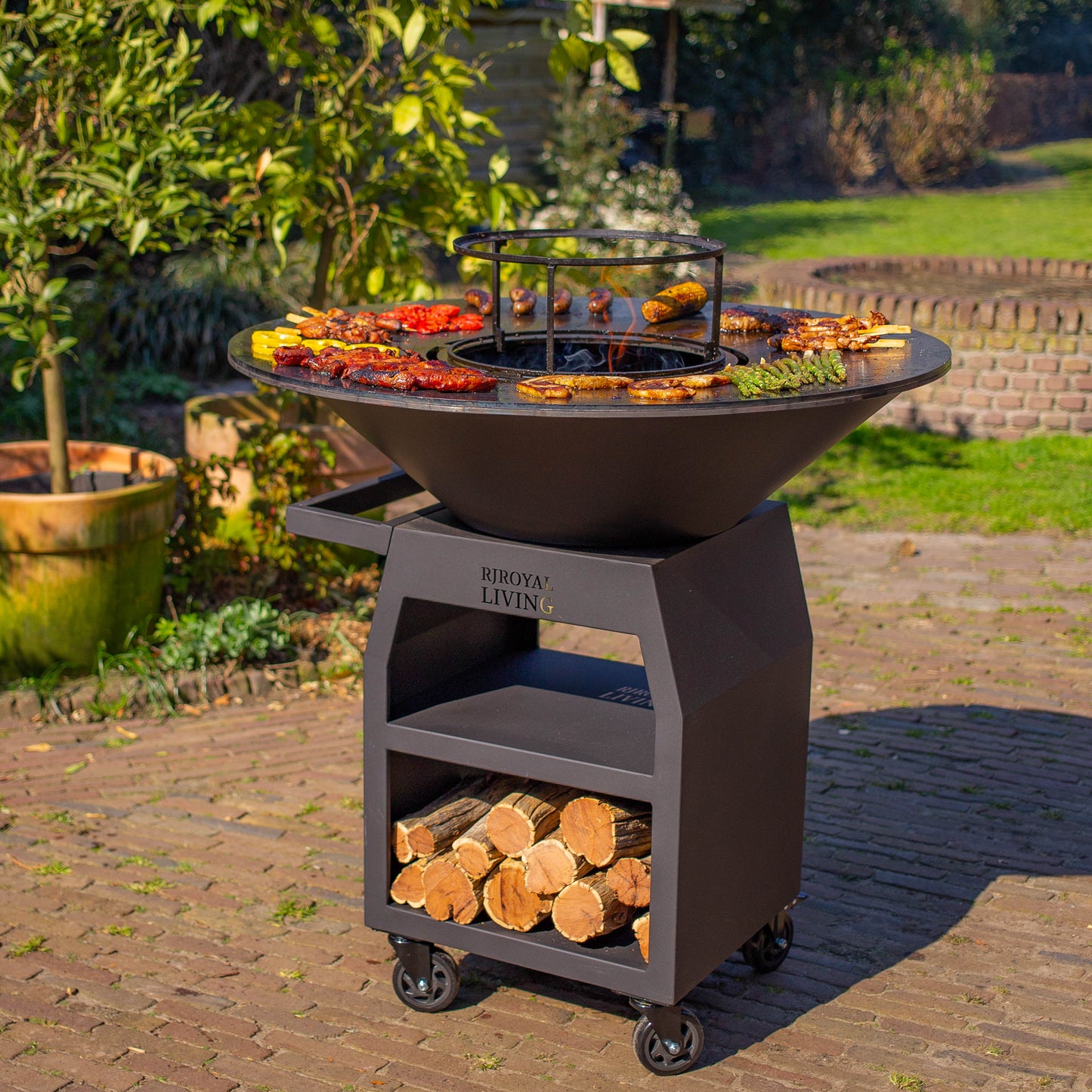 BBQ Plancha Grill Maestro XXXL Ø100cm Blackline - With large wheels and woodstorage
