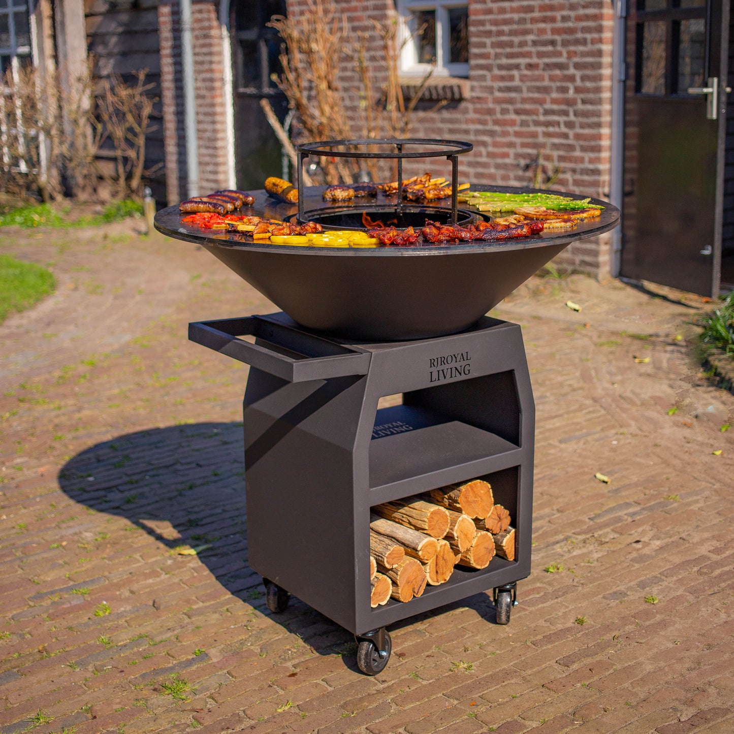 BBQ Plancha Grill Maestro XXXL Ø100cm Blackline - With large wheels and woodstorage