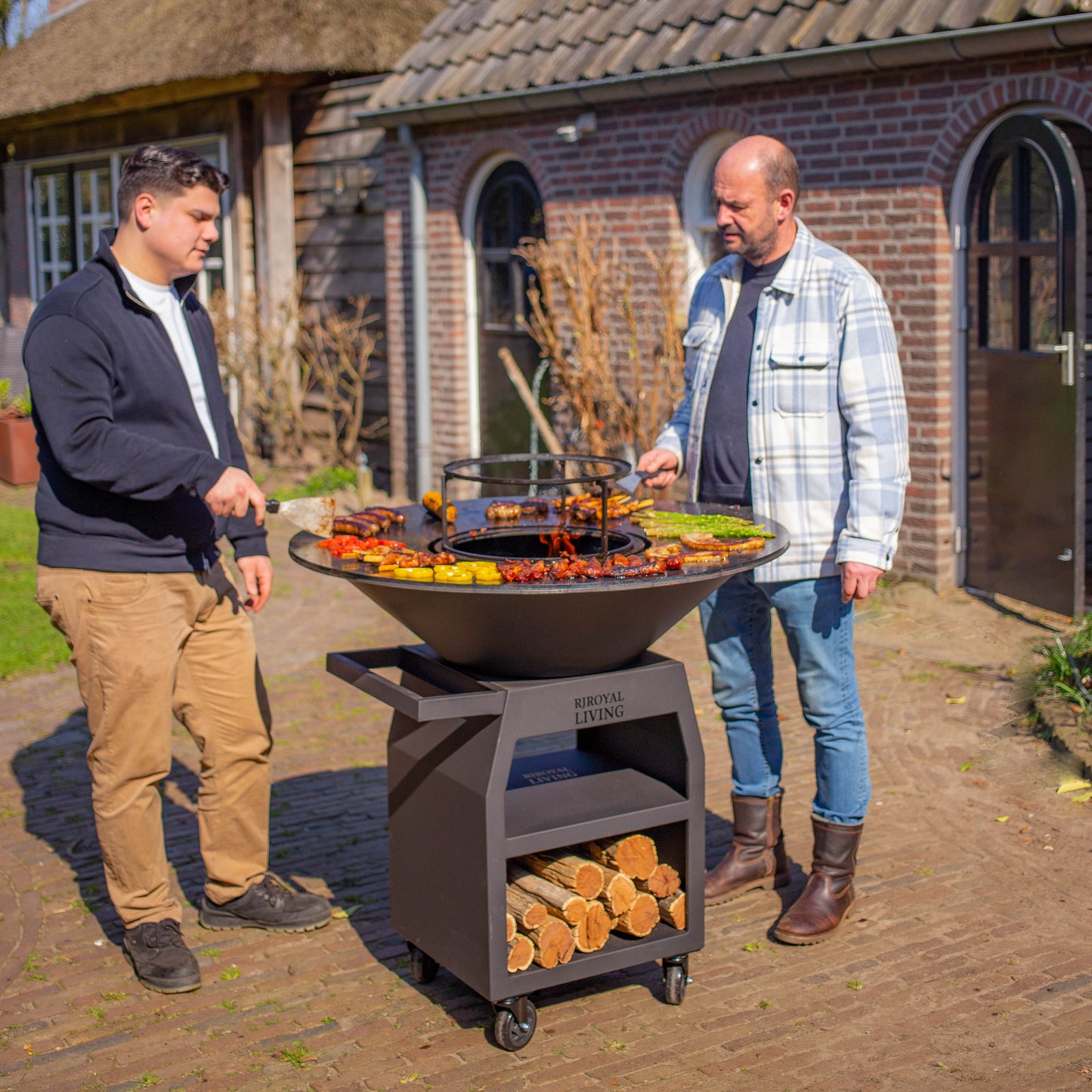 BBQ Plancha Grill Maestro XXXL Ø100cm Blackline - With large wheels and woodstorage