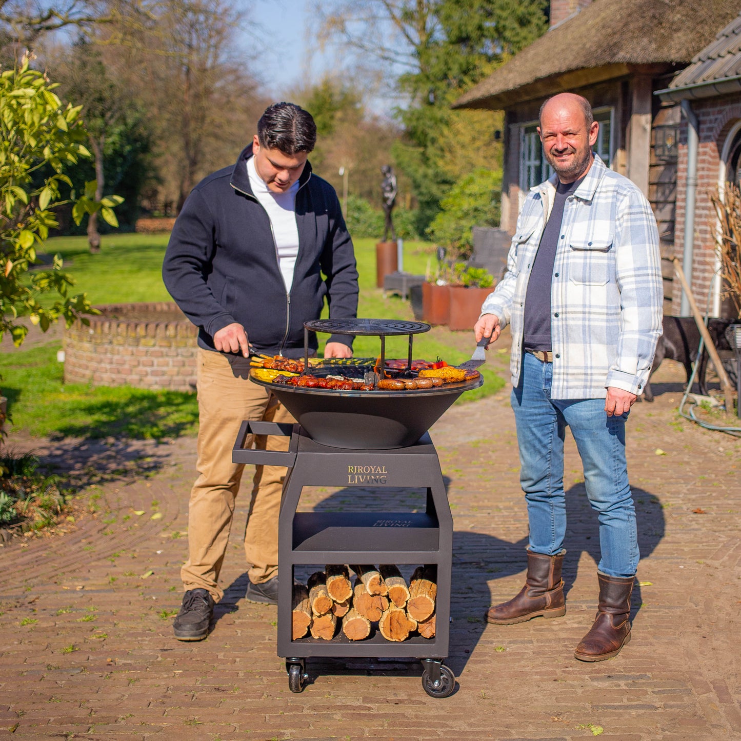 BBQ Plancha Grill Maestro Ø70cm Blackline - With large wheels and wood storage