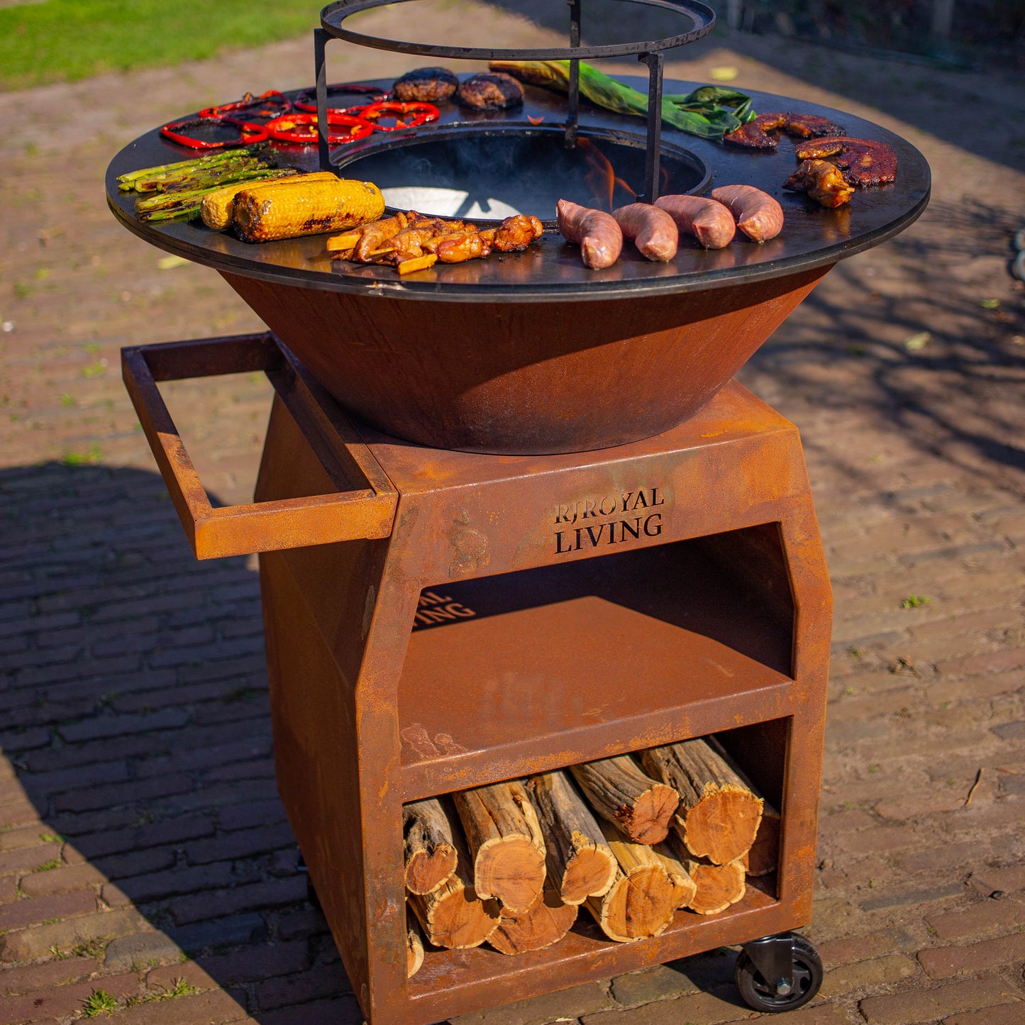 BBQ Plancha Grill Maestro XXL Ø80cm Corten steel - With poker and wood storage