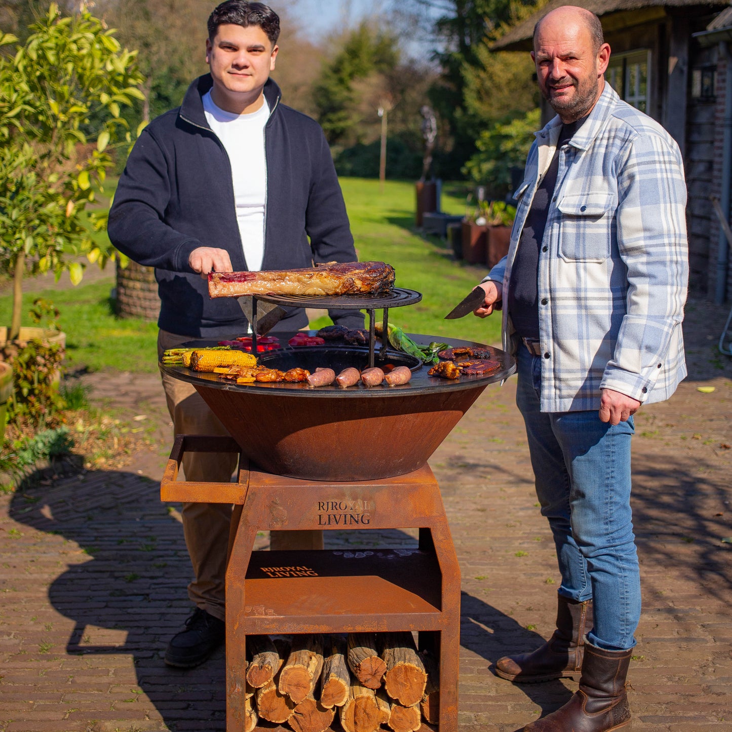 BBQ Plancha Grill Maestro XXL Ø80cm Corten steel - With poker and wood storage