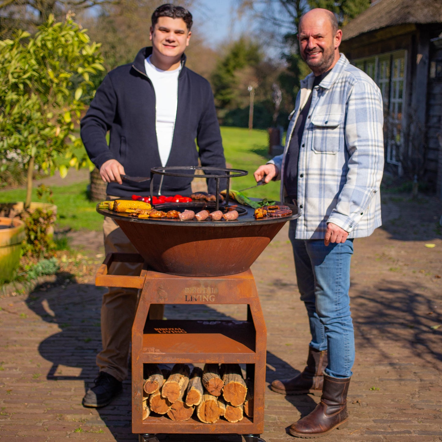BBQ Plancha Grill Maestro XXL Ø80cm Corten steel - With poker and wood storage